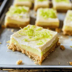These Key Lime Pie Bars are a refreshing and zesty treat that everyone will love! With a buttery graham cracker crust and a creamy lime filling, they're perfect for summer gatherings or any time you crave something sweet and tangy. Don't forget to save this recipe for your next barbecue or picnic!
