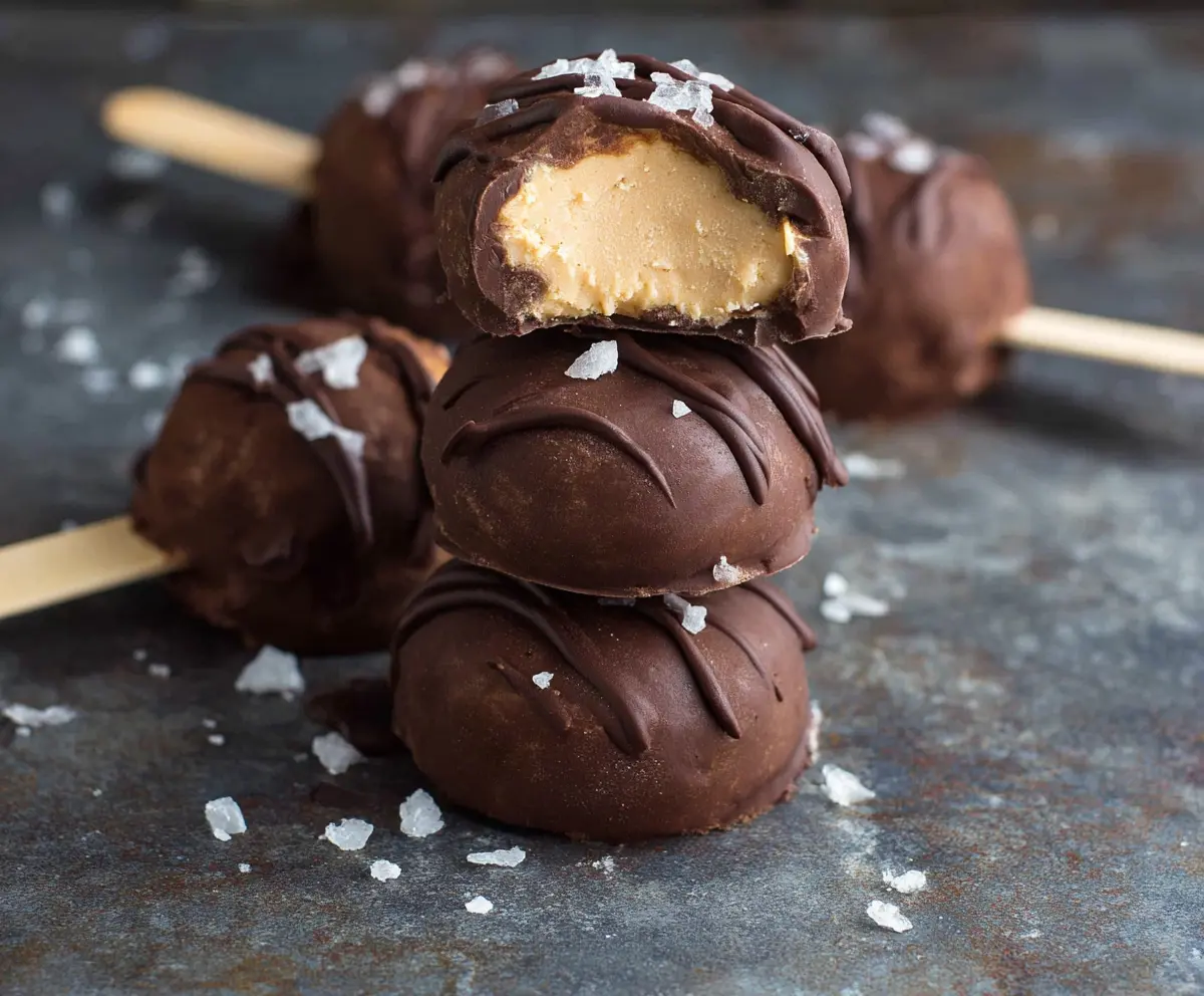 Delicious Chocolate Peanut Butter Frozen Yogurt Bites on a white plate for a chilly dessert treat