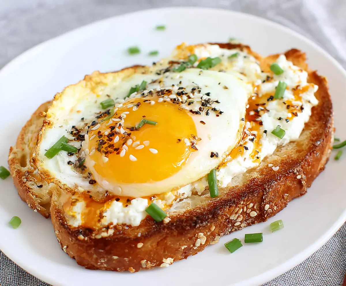 Healthy cottage cheese and egg toast breakfast on a plate