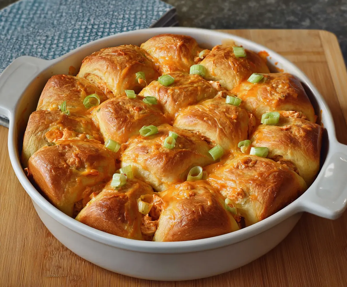Delicious Buffalo Chicken Crescent Roll Bake with spicy chicken and flaky croissants.
