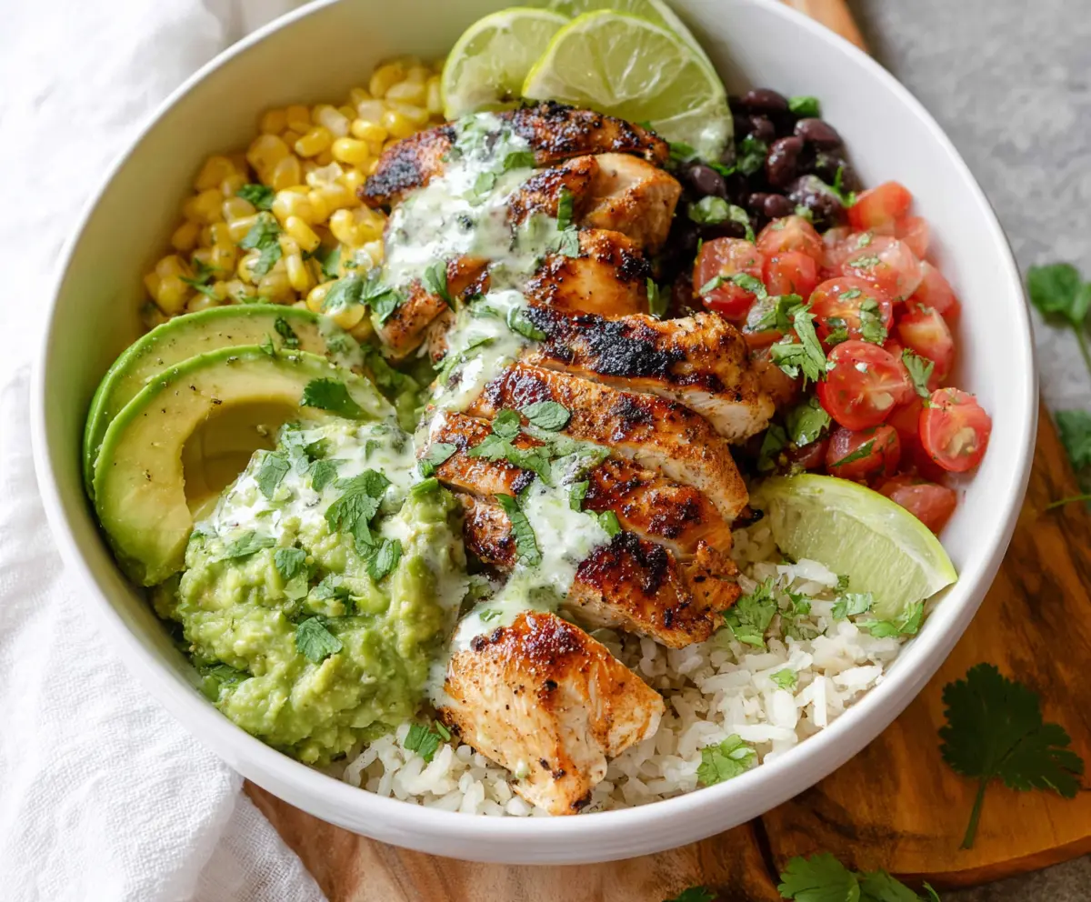 Fresh cilantro lime chicken bowls with vibrant vegetables and grains, perfect for a healthy meal.